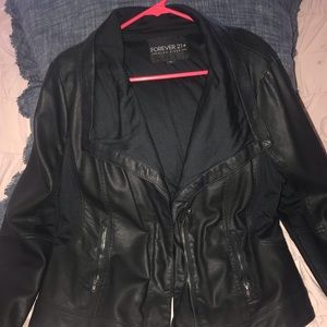 Faux Leather jacket with stretchy arm panels !!